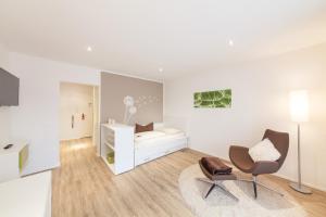 TV a/nebo společenská místnost v ubytování Candlewood Suites Fürth by IHG