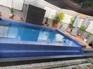 Bazén v ubytování Country Bug Private Resort nebo v jeho okolí