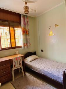 Ένα ή περισσότερα κρεβάτια σε δωμάτιο στο tayri surf house