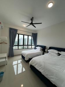 Ένα ή περισσότερα κρεβάτια σε δωμάτιο στο Sunshine Residence