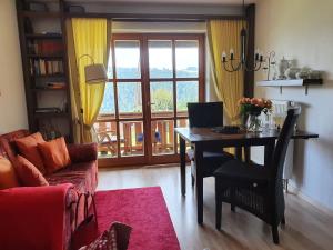 Posezení v ubytování Gemütliche Ferienwohnung Mit Blick Auf Die Donau