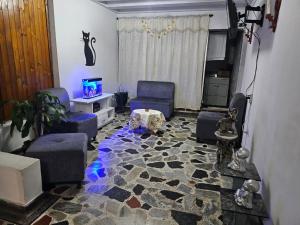 Χώρος καθιστικού στο Hotel Americano Plus