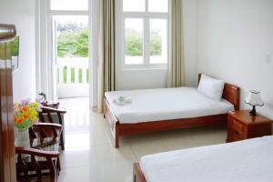 Giường trong phòng chung tại NK 683 - Only 10m to Mikazuki - 50m to the Beach