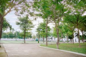 a park with trees and a walkway at Nhà Khách 683 - Only 10m to Mikazuki - 50m to the Beach in Da Nang