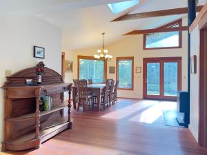 a dining room with a table and a dining room at Private Pond, Dog-Friendly, Peaceful, Golfing in Eastsound