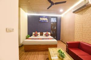 Ένα ή περισσότερα κρεβάτια σε δωμάτιο στο FabHotel Z Heart