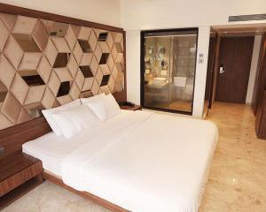 Postel nebo postele na pokoji v ubytování Aveda Estrella