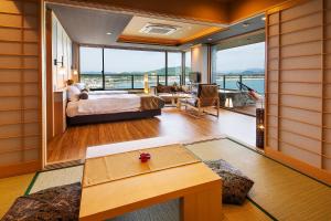 Voodi või voodid majutusasutuse Manpa Resort toas +73 fotot