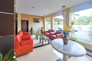 Χώρος καθιστικού στο Urbanview Hotel Gumilang Puncak