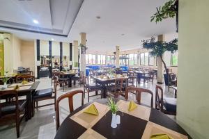 Εστιατόριο ή άλλο μέρος για φαγητό στο Urbanview Hotel Gumilang Puncak