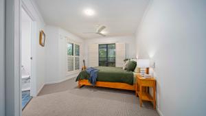 Ένα ή περισσότερα κρεβάτια σε δωμάτιο στο Lilly Pilly - Bangalow - 15 mins drive to Beach