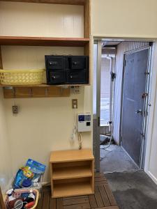 TV a/nebo společenská místnost v ubytování Guest Room Chigasaki