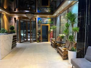 Χώρος καθιστικού στο Hotel Elegant 2