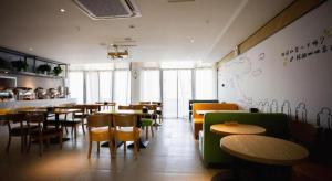 Restaurace v ubytování IU Hotels· Xincheng Haibing University Store