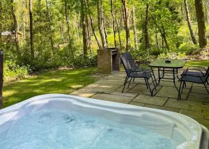 Κήπος έξω από το Woodland Park Lodges