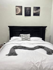 Postel nebo postele na pokoji v ubytování Eka Haven, Apartment in Dar es salaam