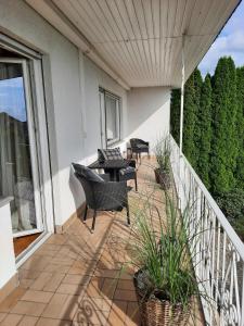 Μπαλκόνι ή βεράντα στο Ferienwohnung Idyll Mit Loggia Und Garten