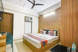 Ένα ή περισσότερα κρεβάτια σε δωμάτιο στο Hotel Ring Roll Inn