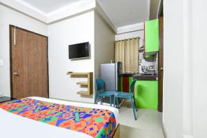 Μια τηλεόραση ή/και κέντρο ψυχαγωγίας στο Hotel Ring Roll Inn