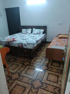 Una cama o camas en una habitación de Green Woods Beach Resort & Spa