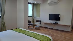 Μια τηλεόραση ή/και κέντρο ψυχαγωγίας στο Sai Inn