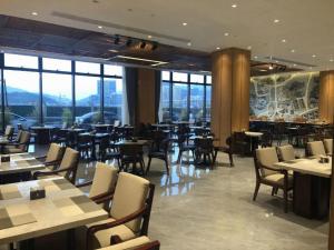 Restaurace v ubytování Yinhu Junyi Hotel（Wildlife Park）