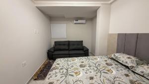 Postel nebo postele na pokoji v ubytování Oasis Urbano + 8 fotografií