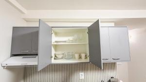 Kuchyň nebo kuchyňský kout v ubytování Oasis Urbano