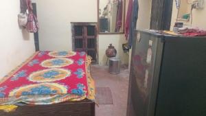 Postel nebo postele na pokoji v ubytování Holipura Stay Home