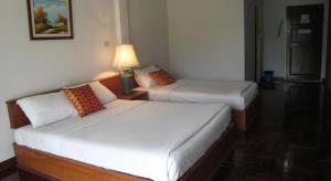 Voodi või voodid majutusasutuse Malai - Asia Resort Tabsakae toas