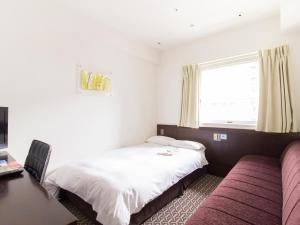 Voodi või voodid majutusasutuse Hearton Hotel Higashi-Shinagawa toas +35 fotot