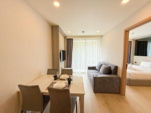 Ένα ή περισσότερα κρεβάτια σε δωμάτιο στο C246 New 1BR Condo with Pool, Gym &Great Location +21 φωτογραφίες