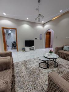 TV a/nebo společenská místnost v ubytování شقة نوارة العلا المفروشة + 6 fotografií
