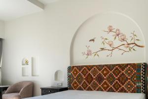 Postel nebo postele na pokoji v ubytování Sost Serena Hotel