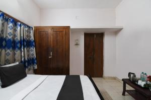 Ένα ή περισσότερα κρεβάτια σε δωμάτιο στο Hotel O Dream Marion +21 φωτογραφίες