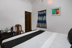 Ένα ή περισσότερα κρεβάτια σε δωμάτιο στο Hotel O Dream Marion