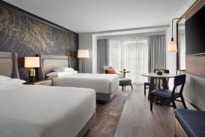 Ένα ή περισσότερα κρεβάτια σε δωμάτιο στο Grand Hyatt Washington +67 φωτογραφίες