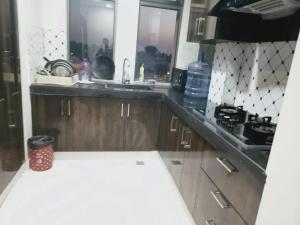 Kuchyň nebo kuchyňský kout v ubytování 1-Bedroom Apartment + 6 fotografií