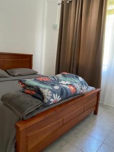 Ένα ή περισσότερα κρεβάτια σε δωμάτιο στο Wolmar bungalows