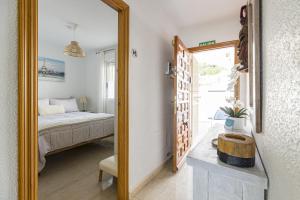 Postel nebo postele na pokoji v ubytování Casa Luna terraza mágica con vistas al mar + 21 fotografií