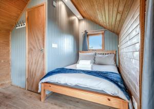 Ένα ή περισσότερα κρεβάτια σε δωμάτιο στο South View Retreat