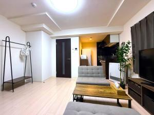 Una televisión o centro de entretenimiento en Excel 美園 -FIX HOME-