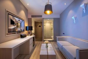 Un lugar para sentarse en Orange Hotel