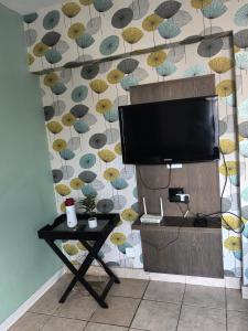 Et tv og/eller underholdning på Unit 25 Oceanic + 6 billeder