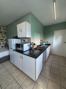 Køkken eller tekøkken på Unit 25 Oceanic