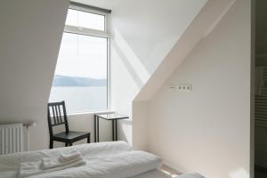 Postel nebo postele na pokoji v ubytování Hotel West + 29 fotografií