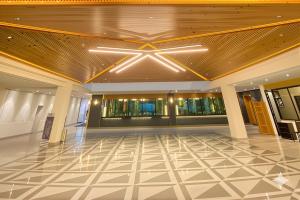 a lobby with a ceiling with a star on it at Luxury Studio at Monal Murree with Mountain Views in Murree