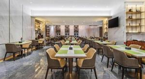 Restaurace v ubytování Dandong Xin An Dong Hotel