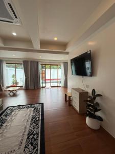 TV a/nebo společenská místnost v ubytování High land pool villas