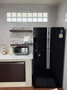 Kuchyň nebo kuchyňský kout v ubytování High land pool villas